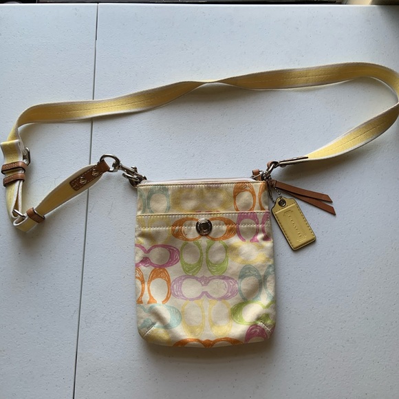 Coach Handbags - Vintage coach cross body! Pastels! Slight staining on the inside (from pencils)